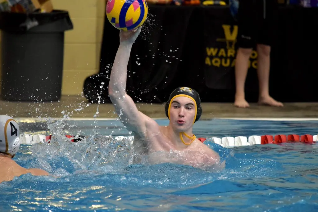 A Pirates player winding up to shoot during a tournament game